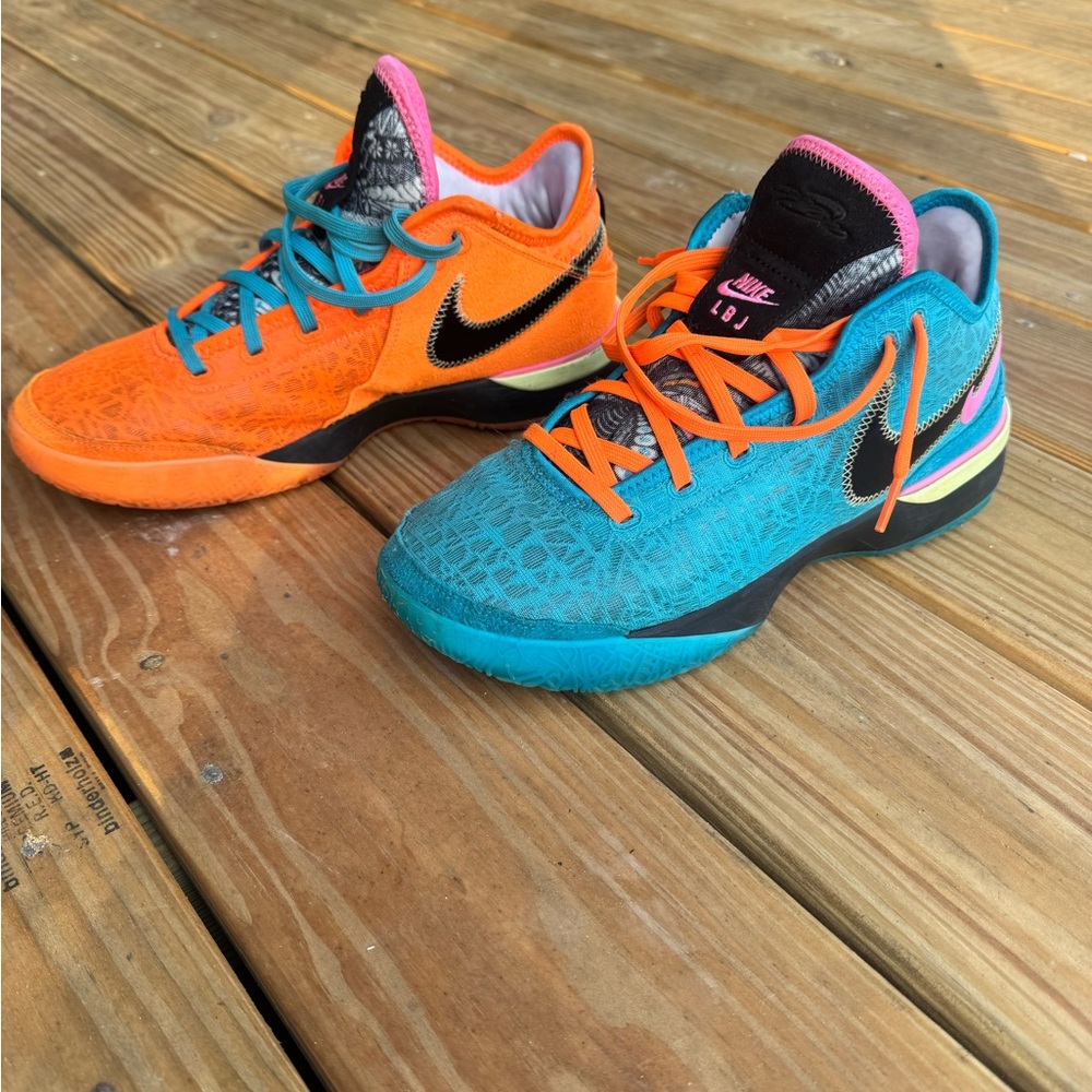 Nike Orange and Blue Athletic Shoes with Low-Cut Design and Lace-Up Closure